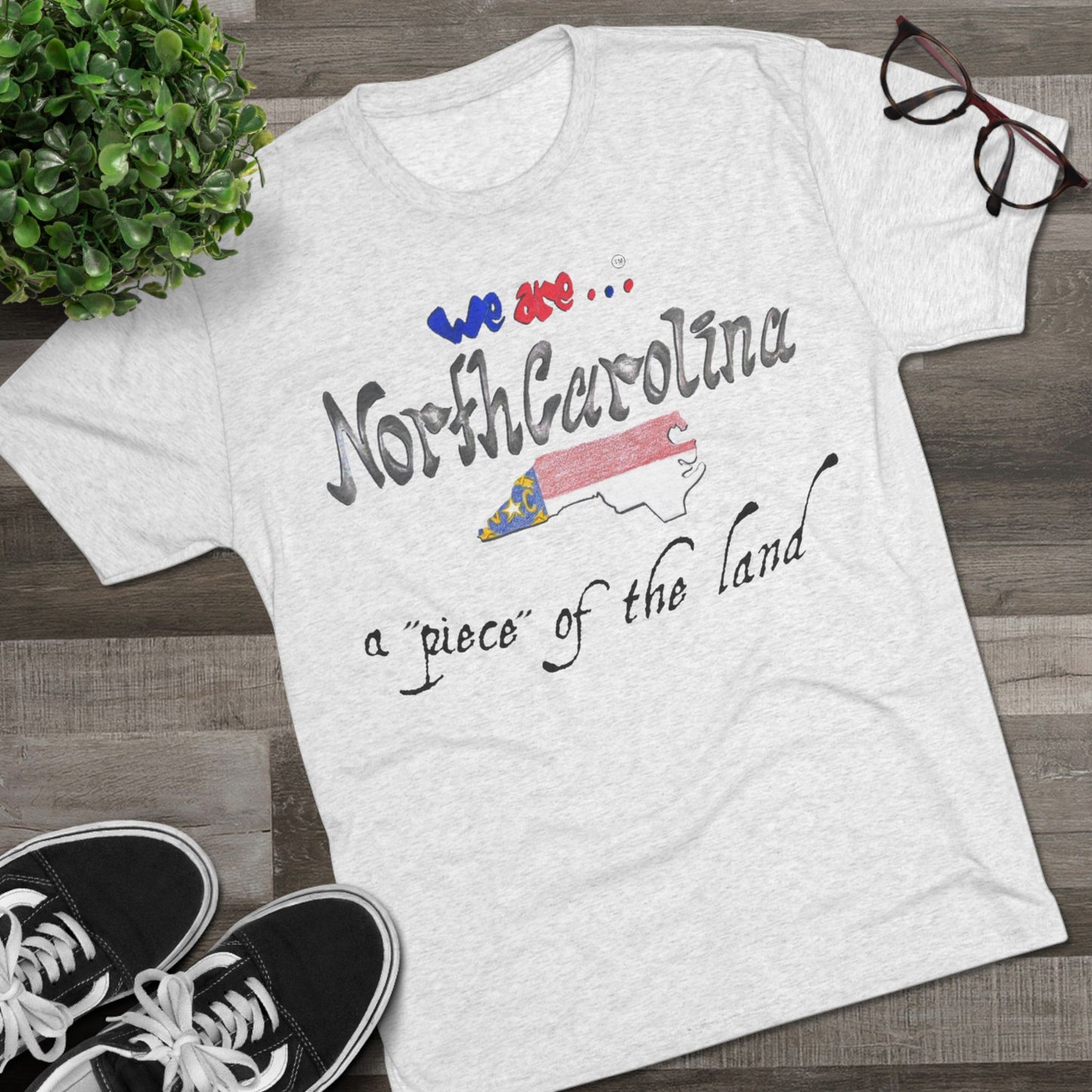 We are... North Carolina Unisex Tri-Blend Crew Tee